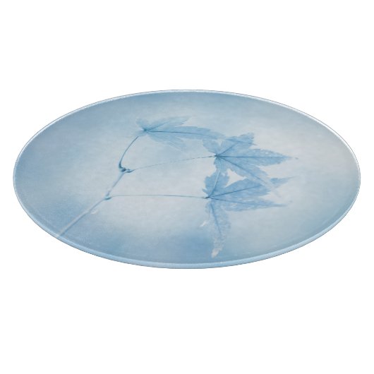 Japanse apelbladeren in blauw snijplank (Hoek)