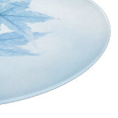 Japanse apelbladeren in blauw snijplank (Hoek)