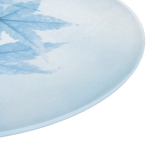 Japanse apelbladeren in blauw snijplank (Hoek)