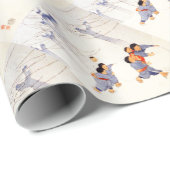 Japanse kinderen die grote sneeuwballen rollen cadeaupapier (Rol Hoek)