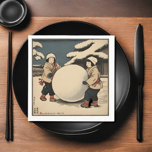 Japanse kinderen rollen grote sneeuwbal servet