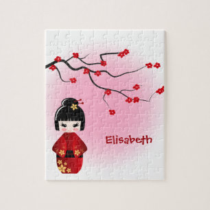 Japanse kokeshi-pop bij sakura blossom legpuzzel