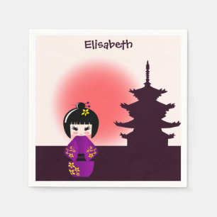 Japanse kokeshi-pop bij tempel tijdens het zonsond servet