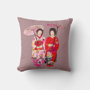 Japanse moderne geisha met roze kimono en obi kussen