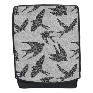 Japanse slikken in de vlucht, houtskool en lichtgr rugtassen