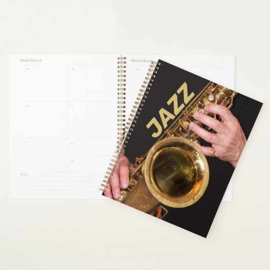 Jazzman die Gold Saxophone foto speelt Planner (Display)
