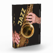 Jazzman die Gold Saxophone speelt Fotoblokken (Links)