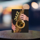 Jazzman die Gold Saxophone speelt Fotoblokken