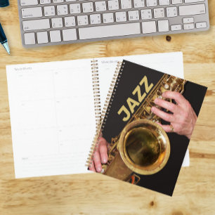 Jazzman die gouden saxofoon speelt foto planner