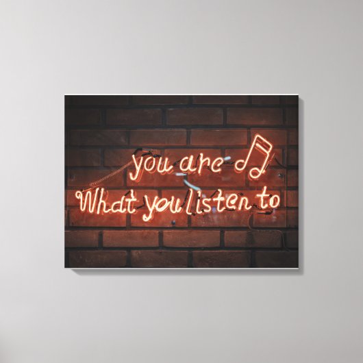 "JE BENT WAT JE LUISTERT NAAR" NEON LICHT TEKEN CANVAS AFDRUK (Voorkant)