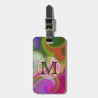 Je brief, kleurrijke rondjes en een aangepast mono bagagelabel