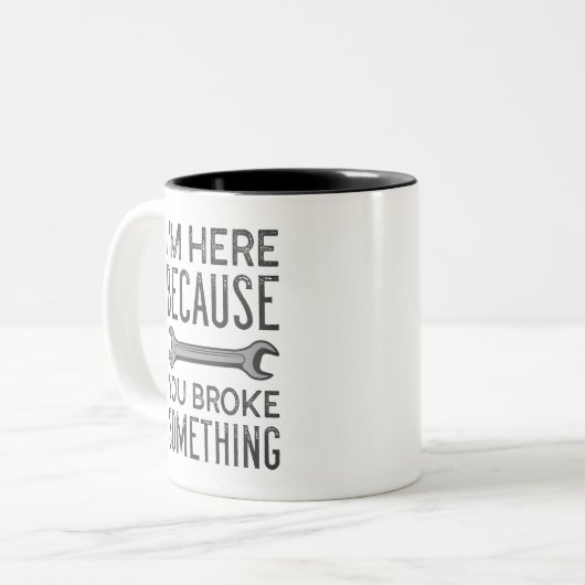 Je hebt iets gebroken tweekleurige koffiemok (Voorkant links)