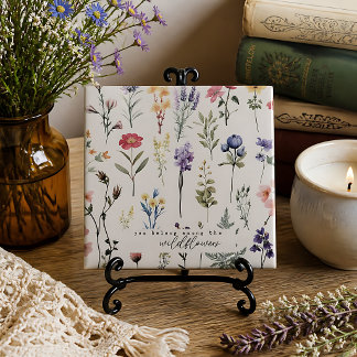 Je hoort tussen de wilde bloemen tegeltje