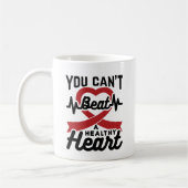 Je kunt geen gezond hart slaan koffiemok (Links)