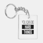 Je kunt harde dingen doen sleutelhanger (Voorkant Links)