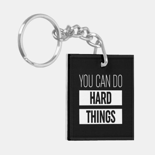 Je kunt harde dingen doen sleutelhanger (Voorkant Links)