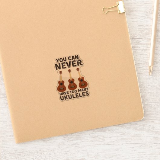 Je kunt nooit te veel ukuleles hebben sticker (Notitieboek)