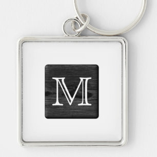 Je Letter Monogram. Afbeelding van Black Wood. Sleutelhanger