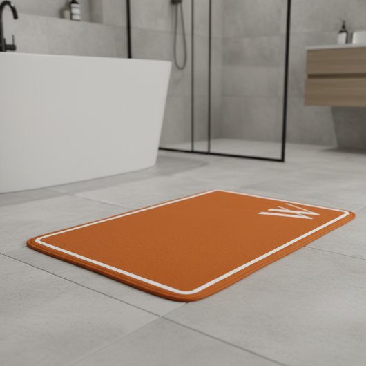 Je monogram in verbrande oranje badmat
