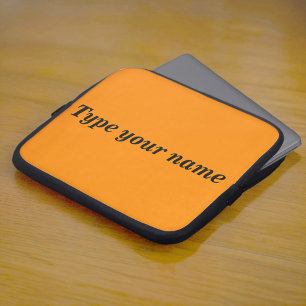 Je naam op oranje laptophoes laptop sleeve