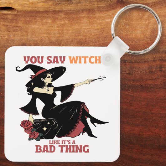 Je zegt heks alsof het slecht is sleutelhanger (Achterkant)