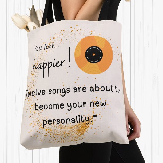 Je ziet er gelukkiger uit! Twaalf liedjes voor je  Tote Bag