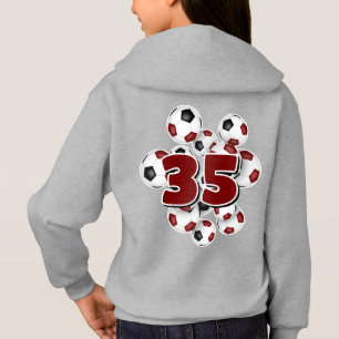 Jersey nummer op groep van voetballen kastanjebrui