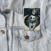 Jester sits on crescent moon wireless charger  button (Insitu)