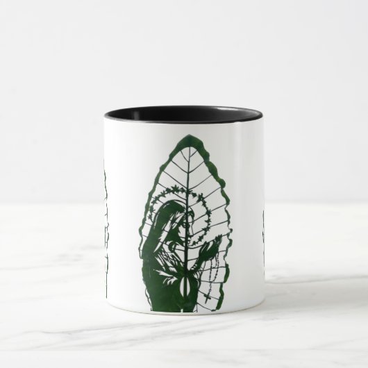 Jesus Carved On A Leaf Mok (Midden)