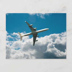 Jet Plane verspreidt zich in wolken Briefkaart