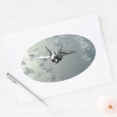 Jet vecht over Zeeen Ovale Sticker (Envelop)