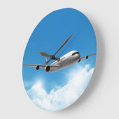 Jet vliegt op de hemel grote klok (Hoek)