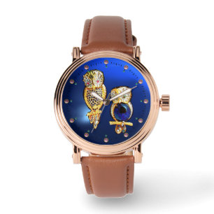 JEWEL OWLS IN BLAUW HORLOGE