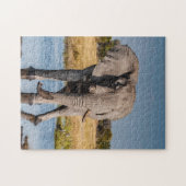 Jigzaag puzzel van olifant in het wild. legpuzzel (Horizontaal)