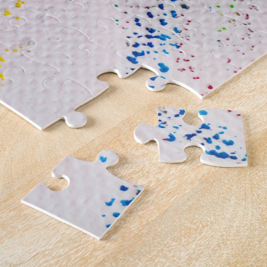 Jigzaagpuzzel van verschillende gekleurde pastelga legpuzzel (Zijkant)