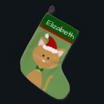 Jingle Bell Santa Oranje Kat Kleine Kerstsok<br><div class="desc">Creëer een gepersonaliseerde voorraad voor je kat of een kattenliefhebber. Dit ontwerp bestaat uit een schattige oranje kat met een kerstkleed en een belletje in kerstkleuren die aan uw behoeften kunnen worden aangepast. Origineel ontwerp van Night Owl's Menagerie,  2018.</div>