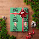 JOE BIDEN GRAPPIG KERSTGIGANT INPAKPAPIER<br><div class="desc">JE BENT GEEN ZWART JOE BIDEN GRAPPIG INPAKPAPIER. GENOEG PAPIER OM AL JE CADEAUTJES IN GRIEZELIGE JOE-STIJL IN TE PAKKEN! LOL</div>