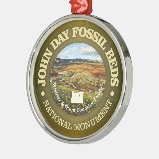 John Day Fossil Bedden (NM) Metalen Ornament (Links)