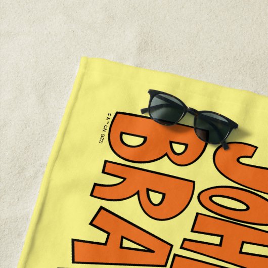 Johnny Bravo Flexing Strandlaken (In situ)