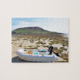 Jol op het strand legpuzzel