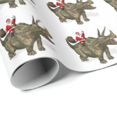 Jolly Santa Claus rijdt op Triceratops Cadeaupapier (Rol Hoek)