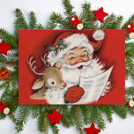 Jolly Santa met Baby Rudolf Custom Feestdagen Kaart<br><div class="desc">Deze kerstkaart toont een halverwege de eeuw illustratie van een jongere kerstman die over zijn lijst kijkt terwijl een baby Rudolf er op kijkt. Op de kaart staat: "Moge je vakantieseizoen vol van liefde en vreugde. Vrolijk kerstfeest!" en kan worden gewijzigd of bewerkt zoals gewenst. Voeg jouw naam(s) toe of...</div>