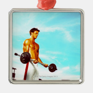 Jong man met blaasbalken metalen ornament