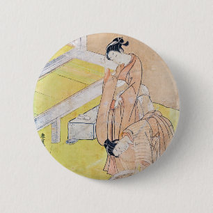 Jong meisje gooit goudvis in vijverknoppen ronde button 5,7 cm