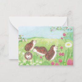 Jonge egels in de weide notitiekaartje