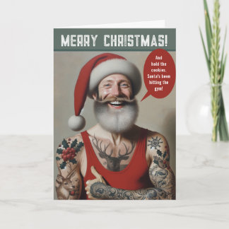 Jonge gespierde Kerstman met tatoeages Feestdagen Kaart