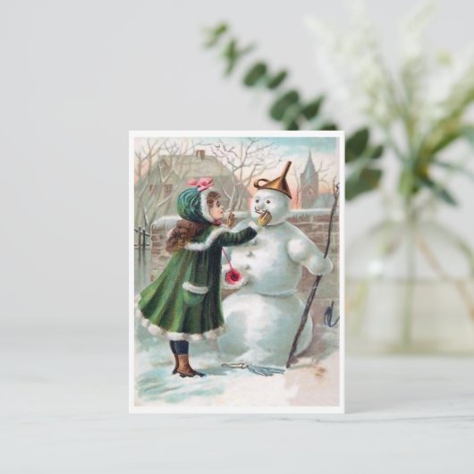 Jonge meid maakt een sneeuwman, een  vakantie briefkaart (Staand voorkant)