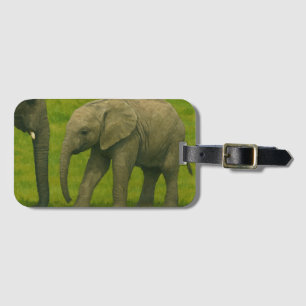 Jonge olifant met voogd in grasreservaat bagagelabel