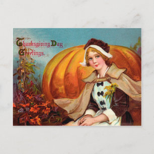  jonge vrouw met een grote pompoenThanksgiving Briefkaart