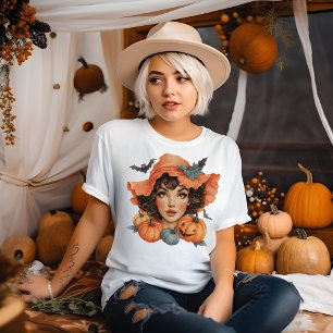 Jonge vrouw met vleermuizen en pompoenen t-shirt
